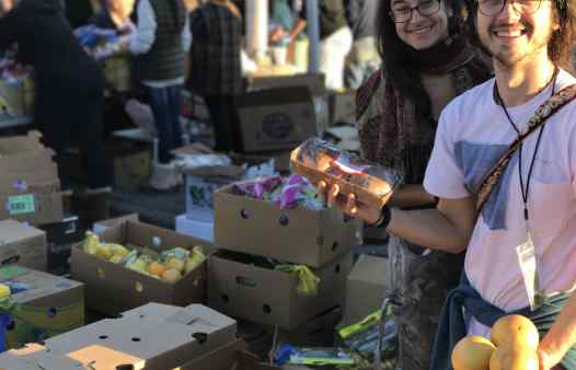 Volunteers Andrew & Lauren, helping at the Community Solidarity Hempstead Food Share