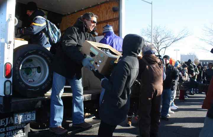 Unloading trucks of donations at the Community Solidarity Hempstead Food Share